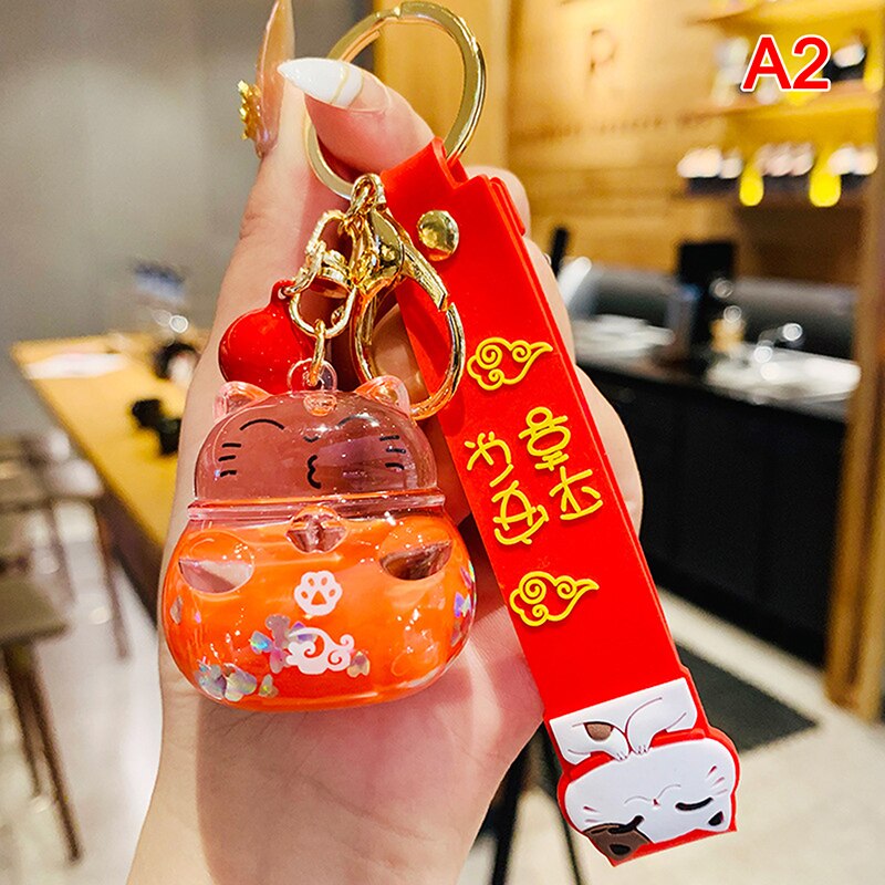 #HA1005 Liquid filled  keychain Lucky Cat keyring Cute Maneki Wristband Keychain For Women Bag Pendent